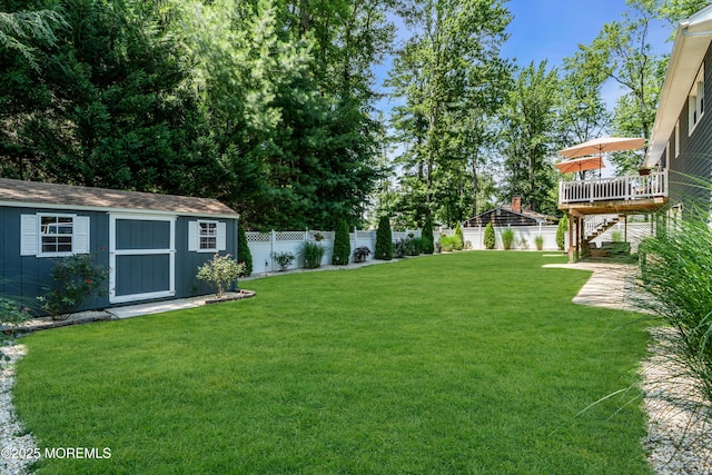 1617 Doris St, Wall, NJ 07719 - fenced backyard featuring stairway, a shed, and a wooden deck