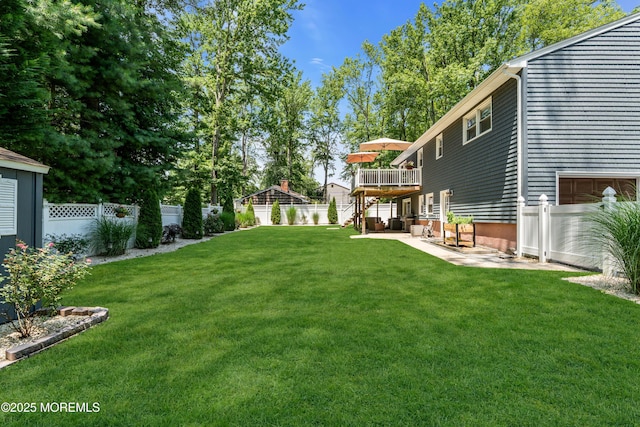 1617 Doris St, Wall, NJ 07719 - fenced backyard with a deck, a garage, and a patio