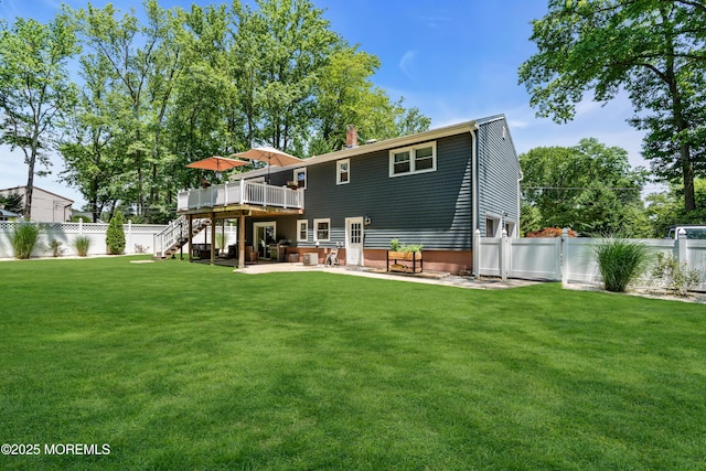 1617 Doris St, Wall, NJ 07719 - back of property with stairs, a wooden deck, a fenced backyard, and a patio area