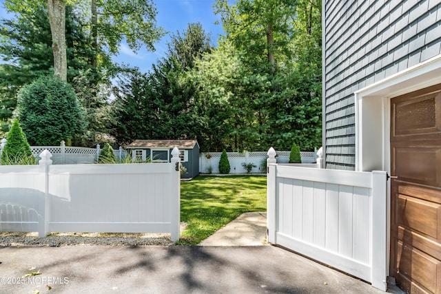 1617 Doris St, Wall, NJ 07719 - gate featuring a fenced backyard and a shed