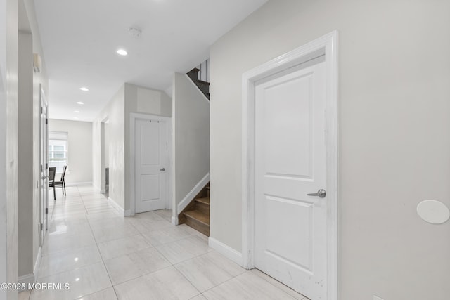 94 Bradhurst Ave, Lakewood, NJ 08701 - corridor featuring light tile patterned floors, stairway, and recessed lighting