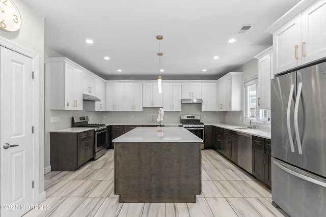 94 Bradhurst Ave, Lakewood, NJ 08701 - kitchen with stainless steel appliances, white cabinetry, light countertops, and recessed lighting
