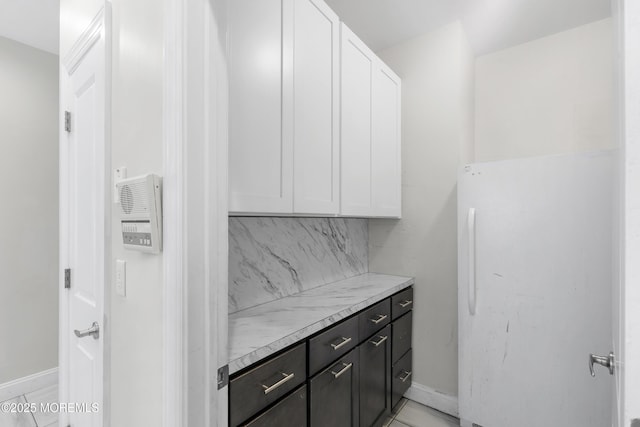 94 Bradhurst Ave, Lakewood, NJ 08701 - kitchen featuring white cabinets, light countertops, and decorative backsplash
