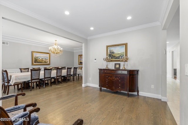 94 Bradhurst Ave, Lakewood, NJ 08701 - living area featuring wood finished floors, a chandelier, recessed lighting, and ornamental molding