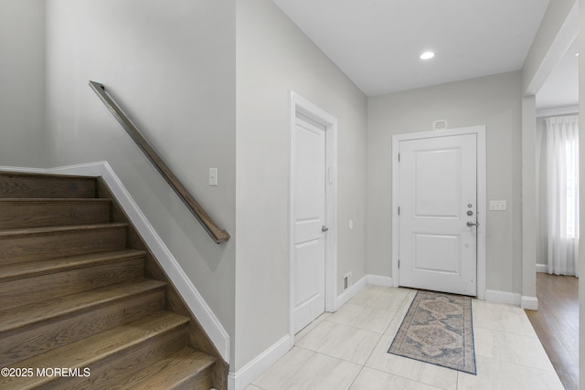 94 Bradhurst Ave, Lakewood, NJ 08701 - foyer featuring stairway and light tile patterned floors