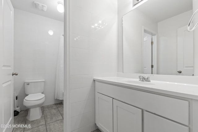 94 Bradhurst Ave, Lakewood, NJ 08701 - bathroom featuring vanity, tile walls, tile patterned floors, and a shower with shower curtain