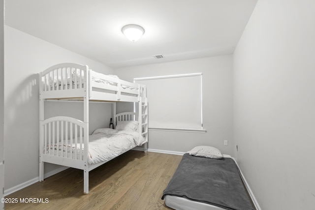 94 Bradhurst Ave, Lakewood, NJ 08701 - bedroom featuring wood finished floors and baseboards