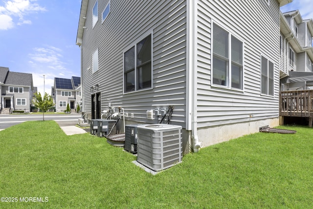 94 Bradhurst Ave, Lakewood, NJ 08701 - view of home's exterior featuring a central air condition unit and a yard