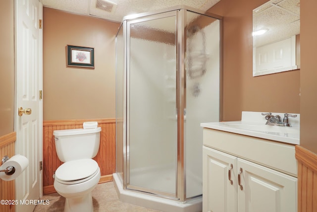 8 N Cherokee Ln, Brick, NJ 08724 - full bath with a wainscoted wall, vanity, a shower stall, tile patterned floors, and a paneled ceiling