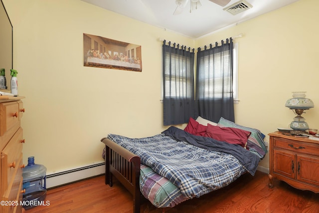 8 N Cherokee Ln, Brick, NJ 08724 - bedroom with a baseboard radiator, wood finished floors, and ceiling fan