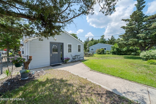 1417 Beach Blvd, Forked River, NJ 08731 - rear view of house featuring a yard and a patio area