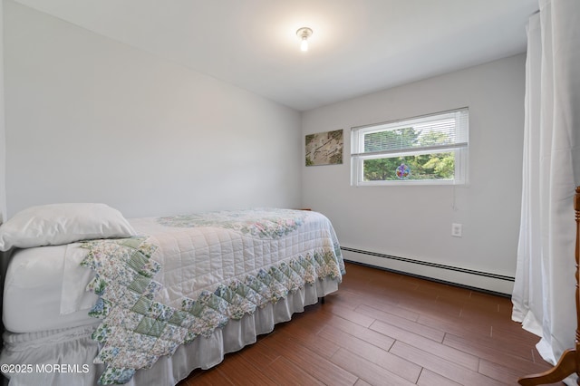 1417 Beach Blvd, Forked River, NJ 08731 - bedroom featuring a baseboard heating unit and wood finished floors