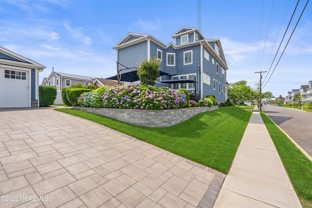114 3rd Ave, Bradley Beach, NJ 07720 - view of front of property featuring a front lawn and driveway