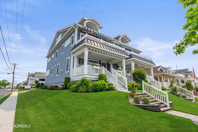 114 3rd Ave, Bradley Beach, NJ 07720 - view of front of property with covered porch and a front lawn