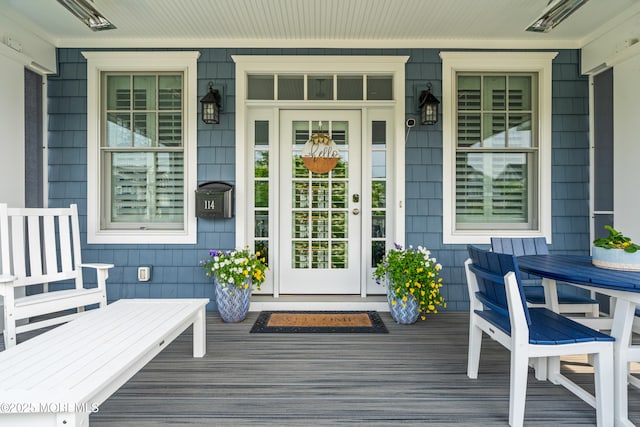 114 3rd Ave, Bradley Beach, NJ 07720 - doorway to property with a porch