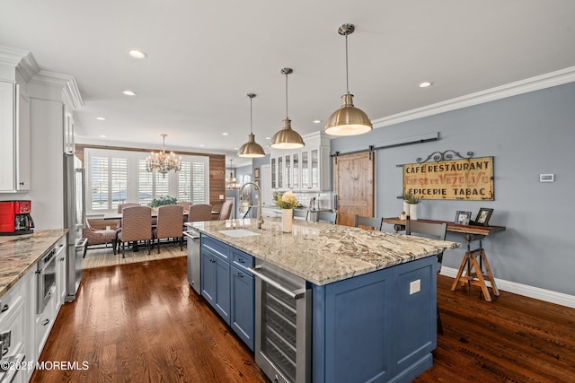 114 3rd Ave, Bradley Beach, NJ 07720 - kitchen with beverage cooler, blue cabinets, white cabinetry, a barn door, and recessed lighting