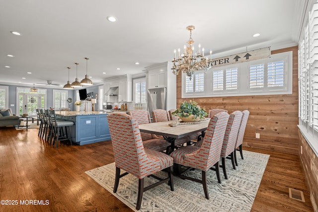 114 3rd Ave, Bradley Beach, NJ 07720 - dining room with plenty of natural light, a chandelier, recessed lighting, wood finished floors, and wood walls