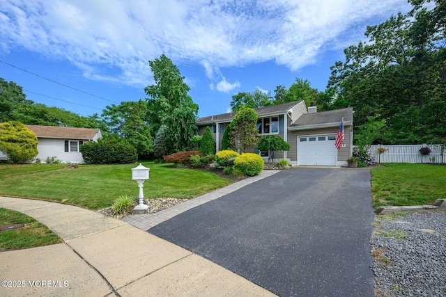 2 Darien Cir, Howell, NJ 07731 - view of front facade with an attached garage, driveway, and a chimney