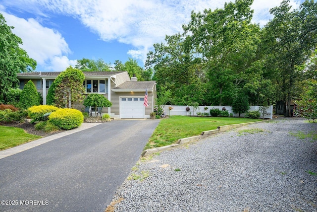 2 Darien Cir, Howell, NJ 07731 - view of front facade featuring asphalt driveway and an attached garage
