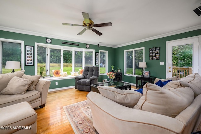 2 Darien Cir, Howell, NJ 07731 - living room with crown molding, a ceiling fan, and light wood-style flooring