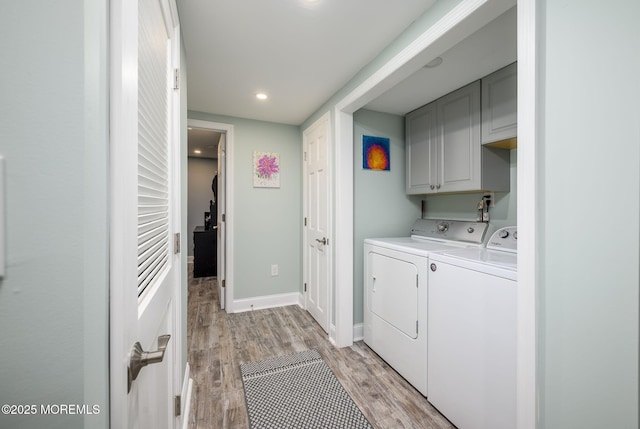 2 Darien Cir, Howell, NJ 07731 - washroom featuring separate washer and dryer, cabinet space, light wood-style flooring, and recessed lighting