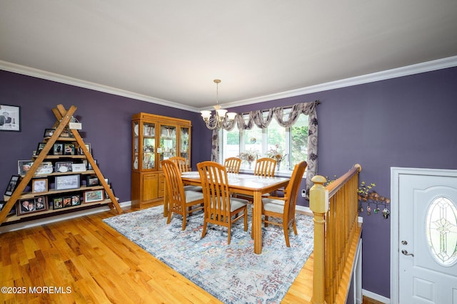2 Darien Cir, Howell, NJ 07731 - dining area featuring a chandelier, light wood finished floors, and crown molding