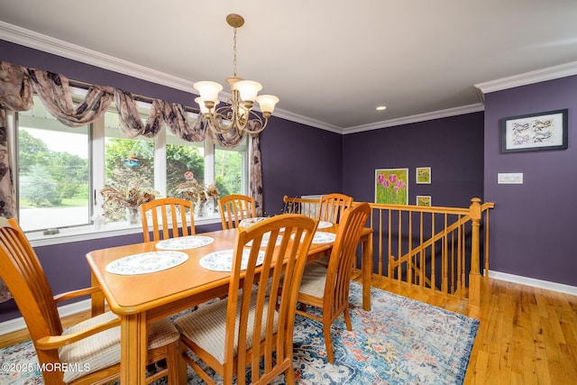 2 Darien Cir, Howell, NJ 07731 - dining space featuring a chandelier, crown molding, and wood finished floors