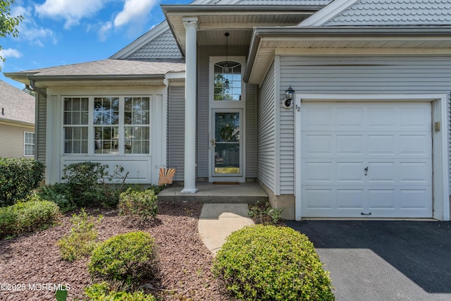 12 Drayton Rd, Manchester, NJ 08759 - view of exterior entry with a garage and driveway