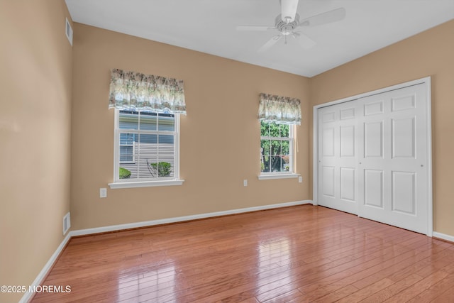12 Drayton Rd, Manchester, NJ 08759 - unfurnished bedroom with wood-type flooring, a closet, and a ceiling fan