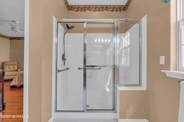 12 Drayton Rd, Manchester, NJ 08759 - ensuite bathroom featuring a shower stall, ceiling fan, and wood finished floors