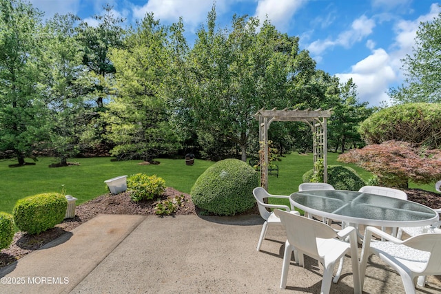 12 Drayton Rd, Manchester, NJ 08759 - view of patio / terrace with a pergola, outdoor dining space, and view of scattered trees