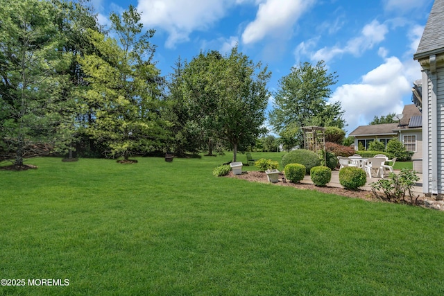 12 Drayton Rd, Manchester, NJ 08759 - view of green lawn with a patio area