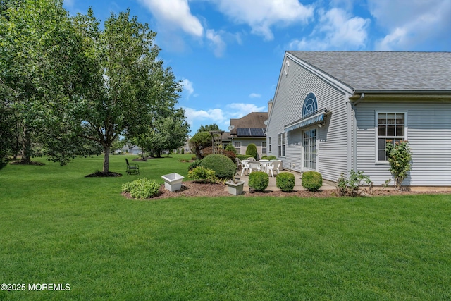 12 Drayton Rd, Manchester, NJ 08759 - view of green lawn featuring a patio area