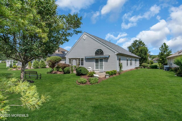 12 Drayton Rd, Manchester, NJ 08759 - back of property featuring a lawn
