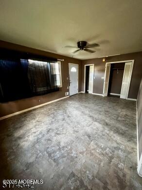 80 Seeley Ave, Keansburg, NJ 07734 - unfurnished bedroom featuring multiple closets and ceiling fan