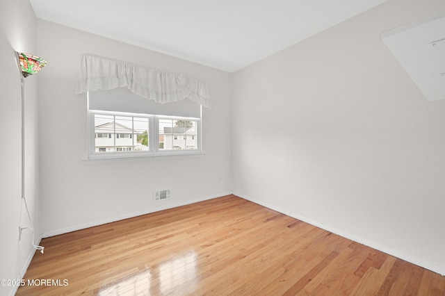 3 Dublin Ln, Hazlet, NJ 07730 - empty room with wood finished floors and baseboards