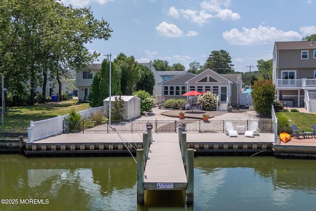 52 Kettle Creek Dr, Brick, NJ 08723 - dock area with a water view and a patio area
