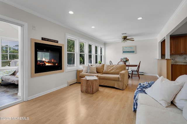 52 Kettle Creek Dr, Brick, NJ 08723 - living room with a baseboard radiator, healthy amount of natural light, ceiling fan, ornamental molding, and recessed lighting