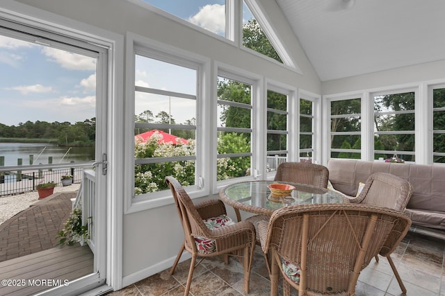 52 Kettle Creek Dr, Brick, NJ 08723 - sunroom featuring a water view, plenty of natural light, stone tile floors, and high vaulted ceiling