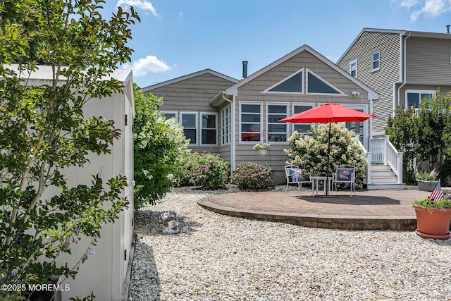 52 Kettle Creek Dr, Brick, NJ 08723 - back of property featuring a patio