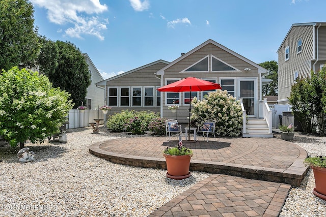 52 Kettle Creek Dr, Brick, NJ 08723 - back of property featuring a patio area