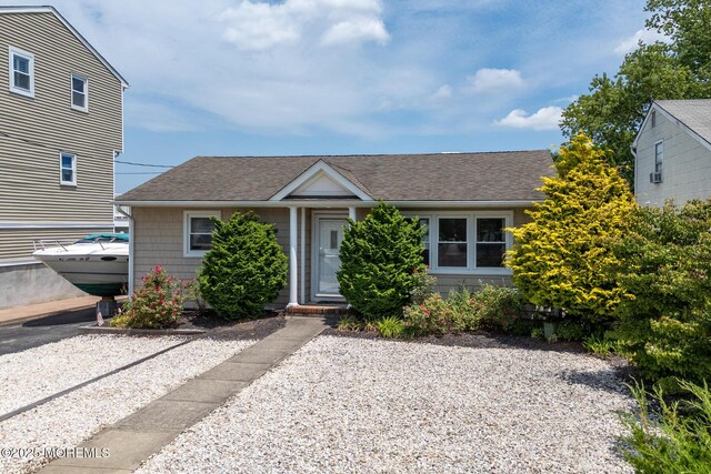 52 Kettle Creek Dr, Brick, NJ 08723 - view of front facade featuring roof with shingles