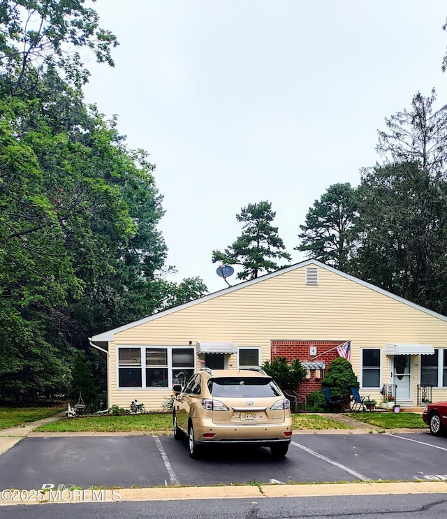 4 Snowberry Ln Unit D, Whiting, NJ 08759 - view of building exterior featuring uncovered parking