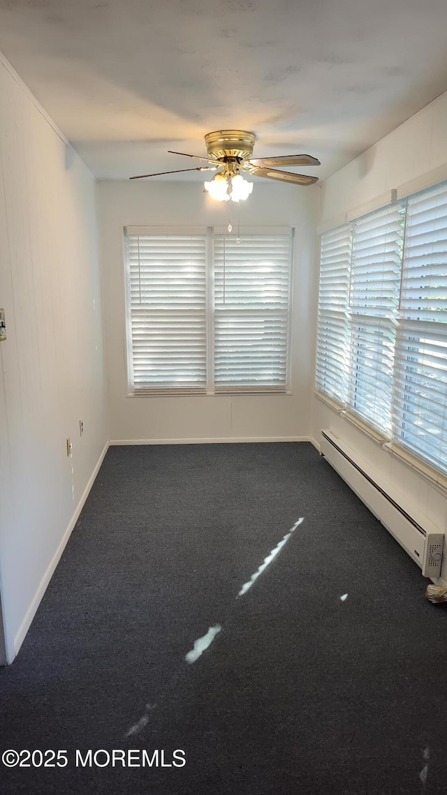 4 Snowberry Ln Unit D, Whiting, NJ 08759 - empty room featuring baseboard heating, carpet, and ceiling fan