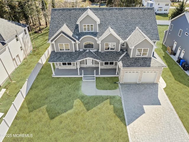 837 Naryshkin Way, Toms River, NJ 08753 - view of front of house with decorative driveway, stone siding, an attached garage, and roof with shingles