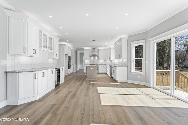 837 Naryshkin Way, Toms River, NJ 08753 - kitchen featuring beverage cooler, wall chimney exhaust hood, tasteful backsplash, a center island, and recessed lighting