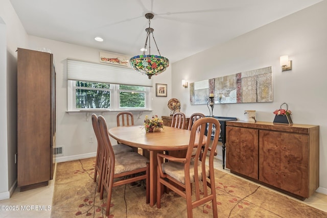 58 Old Bridge Dr, Howell, NJ 07731 - dining area with light tile patterned floors and recessed lighting