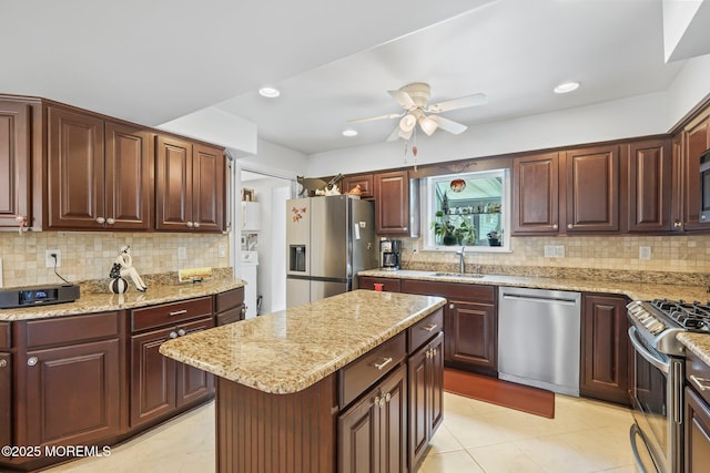 58 Old Bridge Dr, Howell, NJ 07731 - kitchen with stainless steel appliances, a ceiling fan, tasteful backsplash, light stone countertops, and recessed lighting