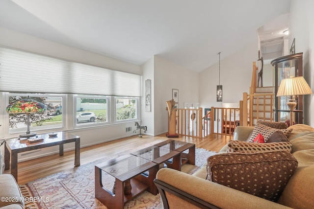 58 Old Bridge Dr, Howell, NJ 07731 - living area featuring wood finished floors and high vaulted ceiling