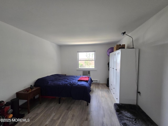 5 Potomac Ln Unit D, Whiting, NJ 08759 - bedroom with light wood-type flooring and a baseboard radiator